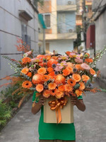 Giỏ hoa nhập khẩu tông cam đẹp